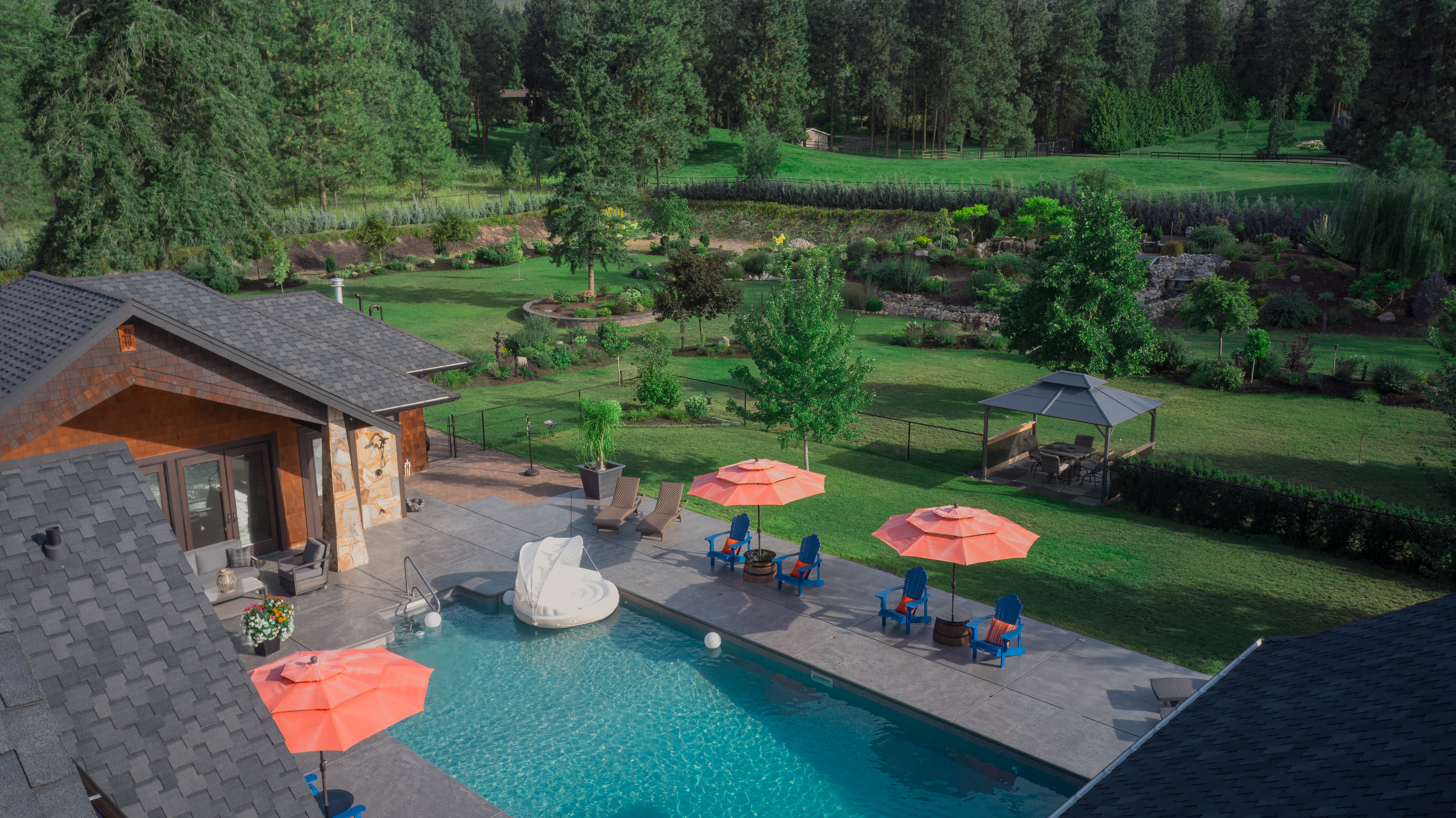 View of the backyard and pool from an upper level